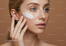 Close-Up of Woman Applying Facial Cream with Freckled Skin