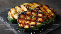 Grilled Zucchini Slices on Black Slate Plate with Char Marks