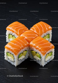 Fresh salmon sushi rolls with avocado and cream cheese
