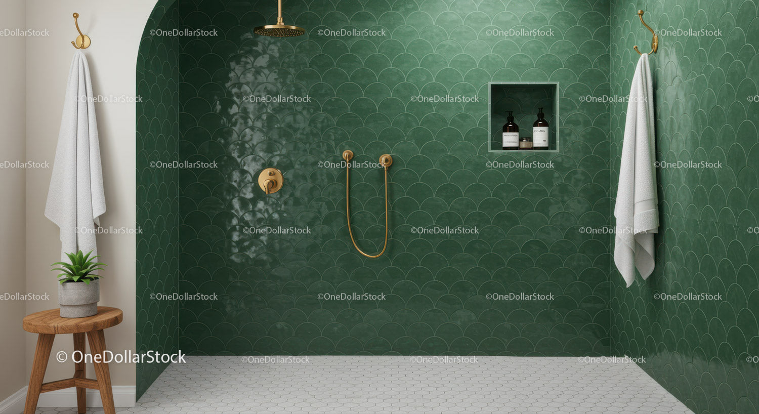 Modern shower with green tiled walls and brass fixtures