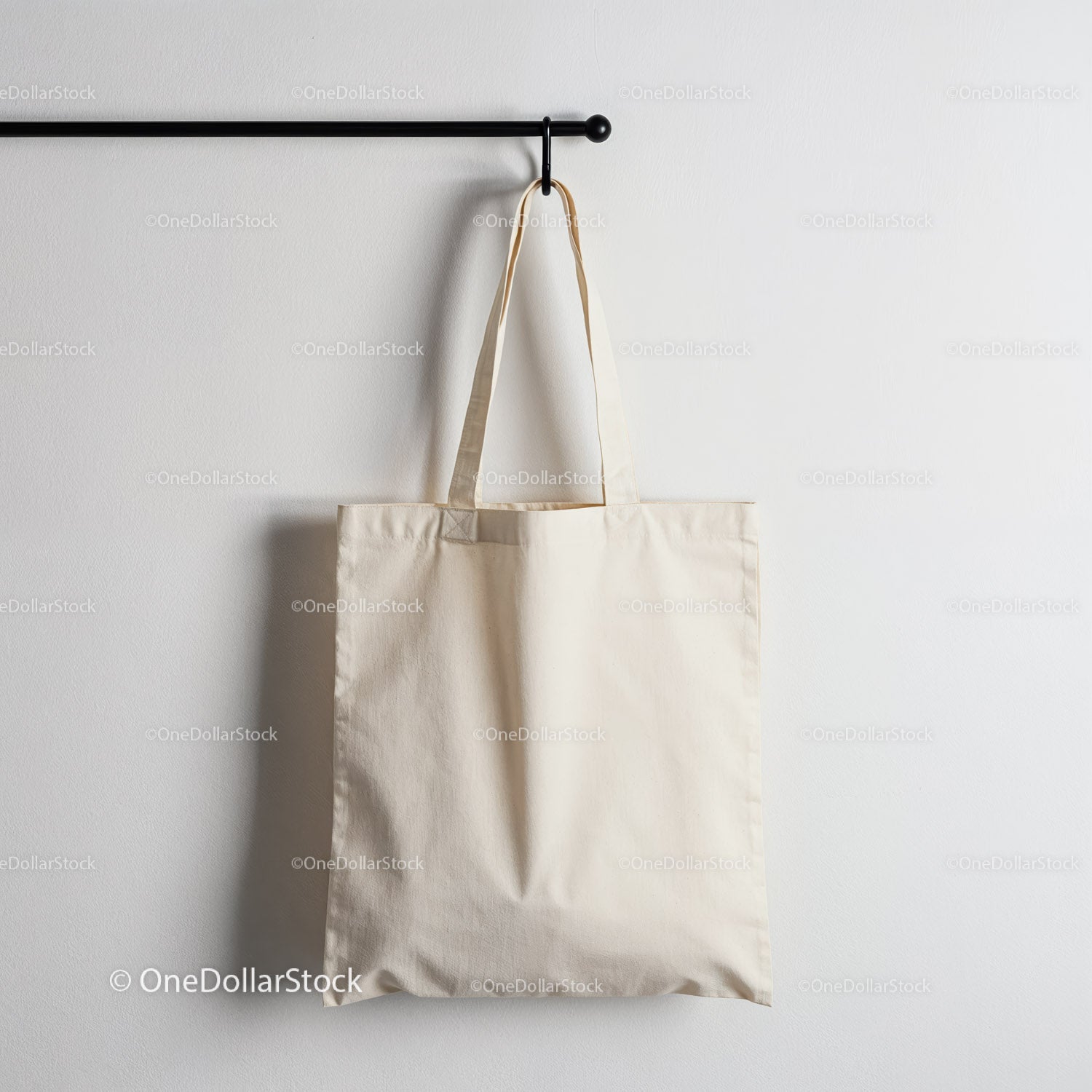 Minimalist Canvas Tote Bag Hanging on Black Rod