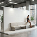 Pensive woman sitting on modern bench in bright lobby