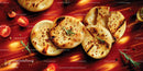 Salty Flatbread with Cherry Tomatoes and Fresh Rosemary on Rustic Wooden Surface