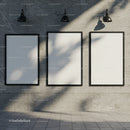 Blank Vertical Posters on Concrete Wall with Soft Shadows