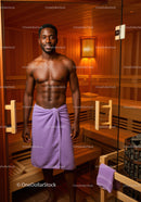 Relaxing Man in Towel in Sauna with Wooden Interior
