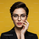 Elegant Woman with Short Dark Hair and Glasses in Studio Portrait