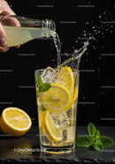 Refreshing Lemonade Splash with Ice and Fresh Mint