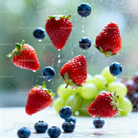 Fresh Strawberries and Blueberries with Water Drops