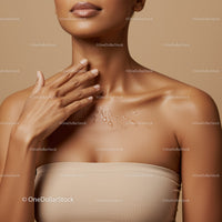 Close-Up of Elegant Woman with Glowing Skin and Nude Shoulder