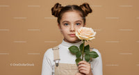 Young Girl with Pale Peach Rose Portrait on Soft Beige Background