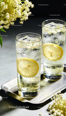 Refreshing elderflower lemon soda with ice cubes