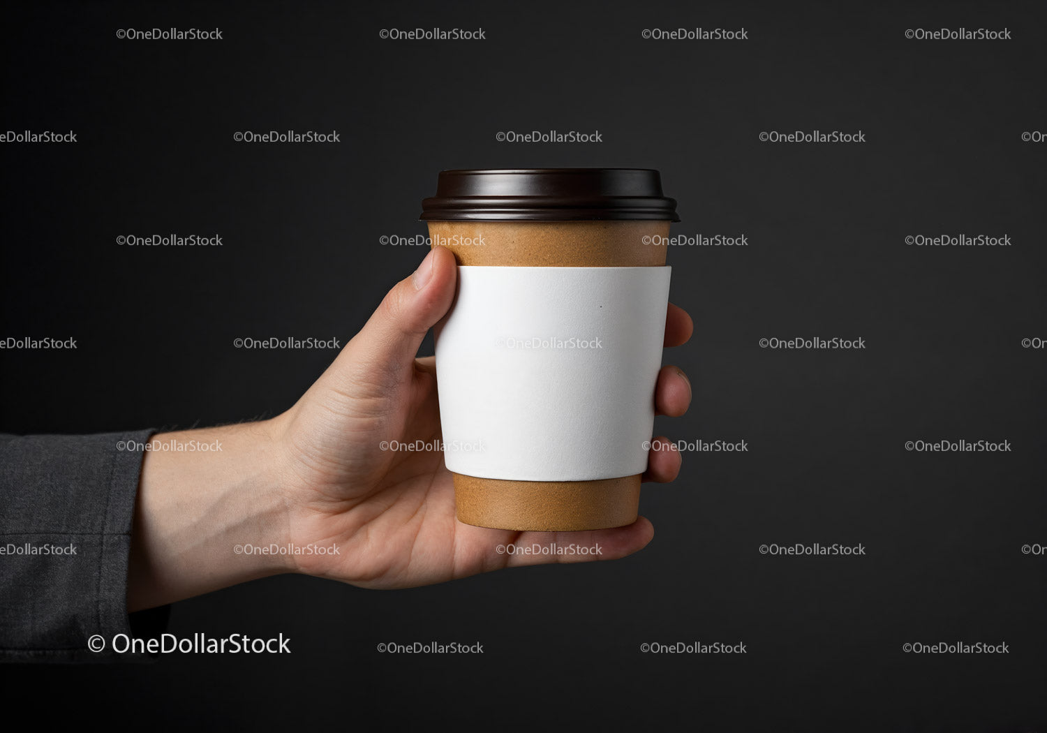 Hand Holding Takeaway Coffee Cup with White Sleeve