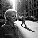 Elegant Elderly Woman Walking in a Black and White City Street Scene