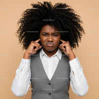 Frustrated Woman Covering Ears with Annoyed Expression