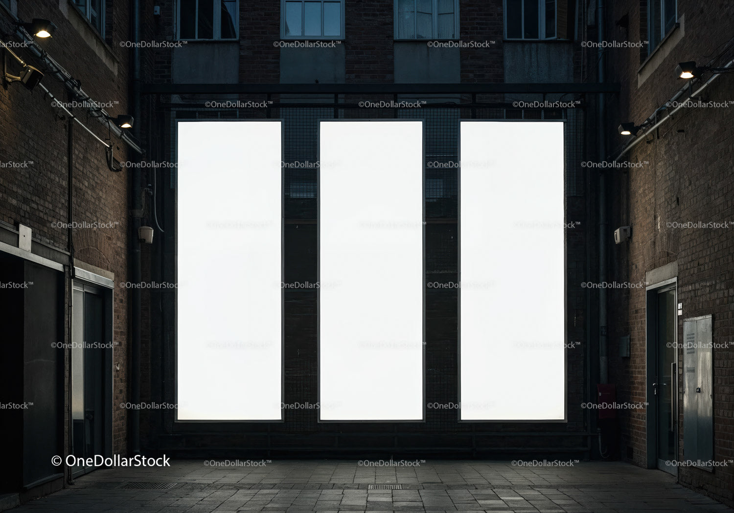 Empty urban alley with three large blank billboards