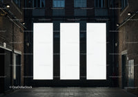 Empty urban alley with three large blank billboards