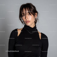 Stylish Young Woman with Short Hair and Silver Earrings in Fashion Portrait
