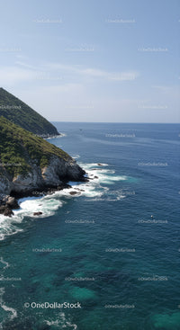 Scenic Coastal Cliffs and Blue Ocean with Rocky Shoreline