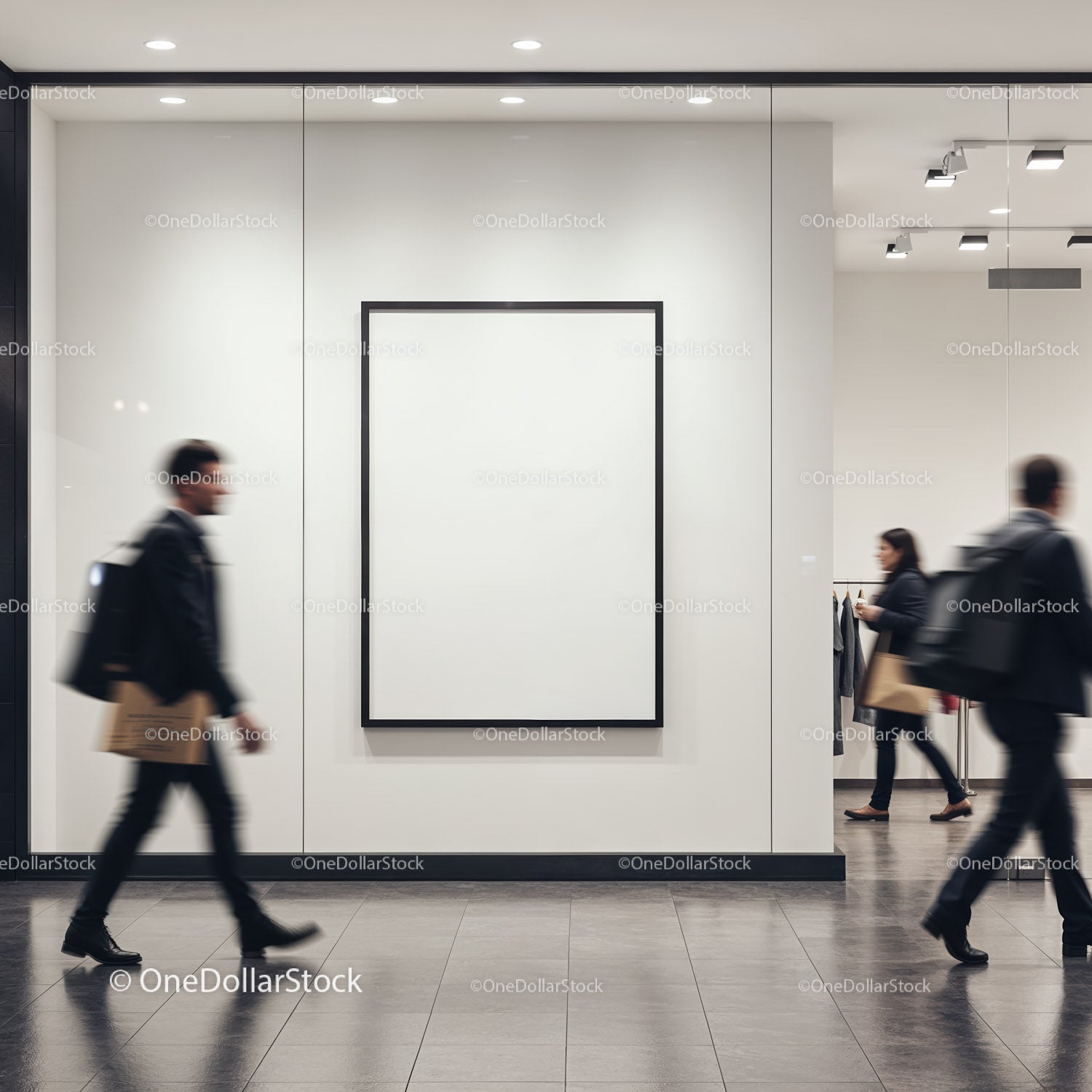 People walking past blank black frame in modern shopping mall