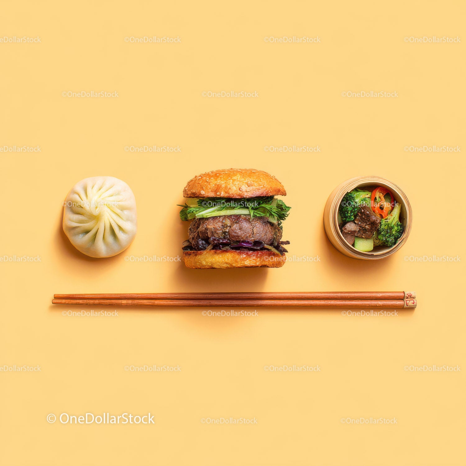 Gourmet Burger with Lettuce and Tomato Next to Grilled Steak and Dumpling
