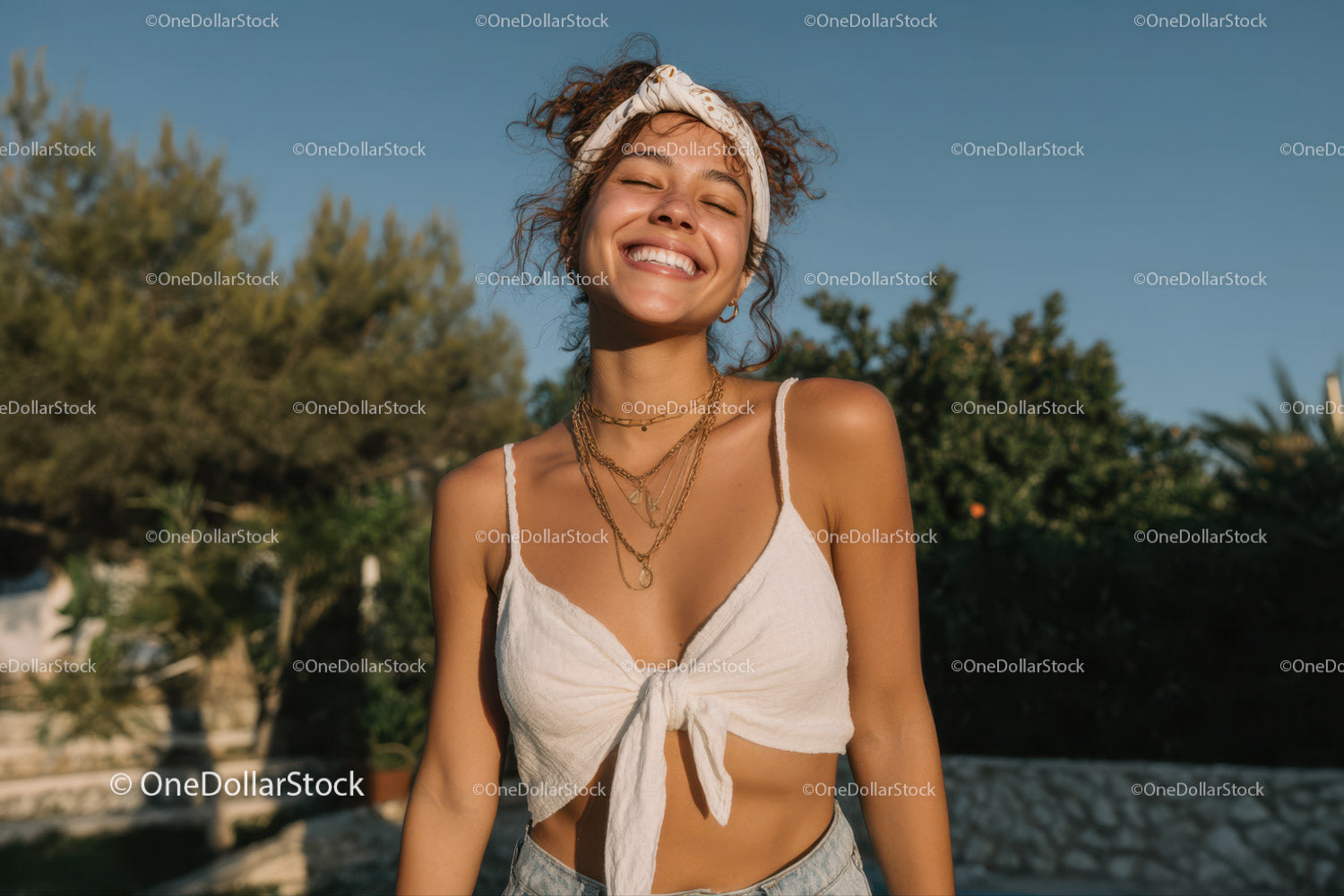 Joyful Young Woman Smiling in Bright Summer Outdoor Scene