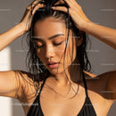 Portrait of a Woman with Wet Hair and Smooth Skin in Studio