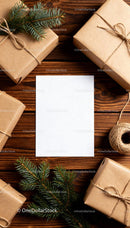 Blank card with rustic wrapped gifts and pine branches JPG Mockup Image preview