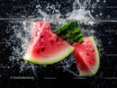 Juicy Watermelon Slices Splashing into Water in Dynamic Close-Up