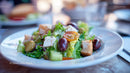 Fresh Garden Salad with Tomatoes Olives Feta Cheese and Croutons