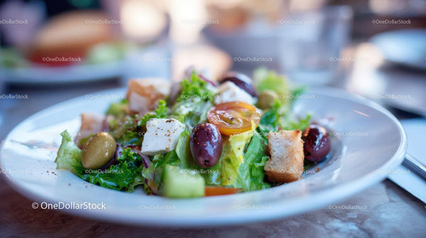 Fresh Garden Salad with Tomatoes Olives Feta Cheese and Croutons