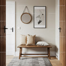 Stylish Cozy Entryway with Wooden Bench and Abstract Wall Art