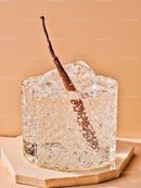 Refreshing Sparkling Water with Vanilla Bean on Stone Coaster