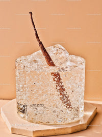 Refreshing Sparkling Water with Vanilla Bean on Stone Coaster