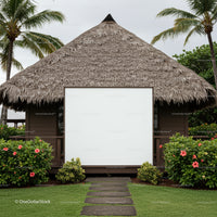 Tropical bungalow with blank white sign surrounded by greenery