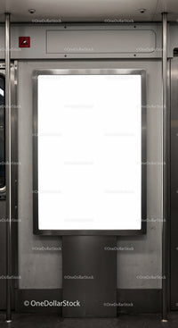 Blank illuminated advertising board inside subway train