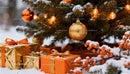 Snowy Christmas Scene with Golden Ornaments and Gifts