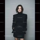 Stylish Woman in Black Blazer and Skirt in a Minimalist Photo Setup