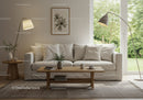 Cozy living room with neutral sofa and natural light