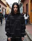 Fashionable Woman Wearing Black Hoodie in Urban City Street