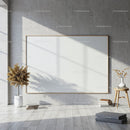 Minimalist room with blank canvas and natural light