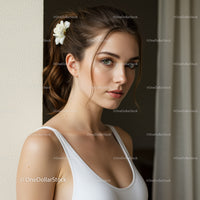 Elegant Young Woman with Green Eyes in a Casual White Top