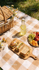 Fresh Sandwiches and Fruit on a Cozy Picnic Blanket