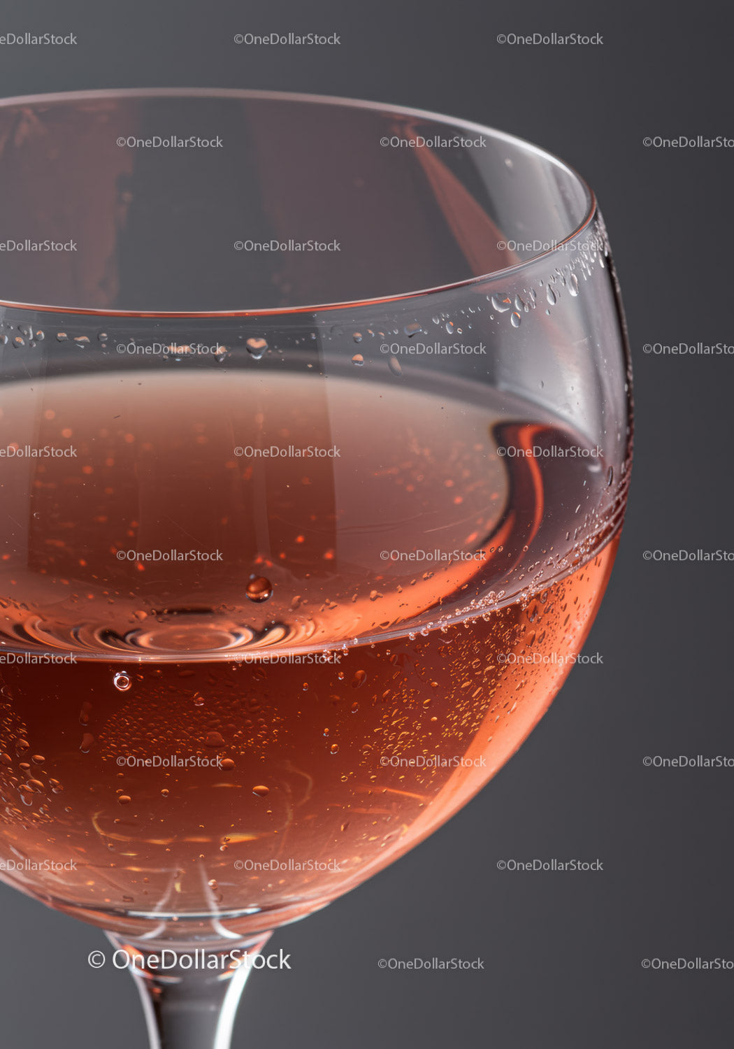 Close Up of Sparkling Rosé Wine in Glass