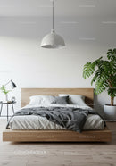 Modern Bedroom with Green Monstera and Wooden Bed Frame