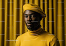 Stylish man wearing yellow beret and turtleneck sweater