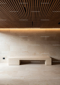Modern Minimalist Interior with Beige Stone Bench and Wooden Ceiling