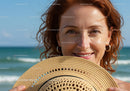 Joyful Woman with Straw Hat at the Beach