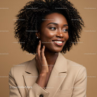 Elegant African American Woman in Beige Blazer with Curly Hair