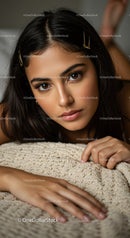 Portrait of a Young Woman Lying on Rug with Elegant Hair Accessories