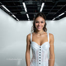 Young Woman Smiling in Stylish Studio Portrait